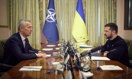 NATO Secretary General Jens Stoltenberg, left, and Ukrainian President Volodymyr Zelenskyy, right, talk during their meeting in Kyiv, Ukraine, Thursday, April 20, 2023. (Ukrainian Presidential Press Office via AP)