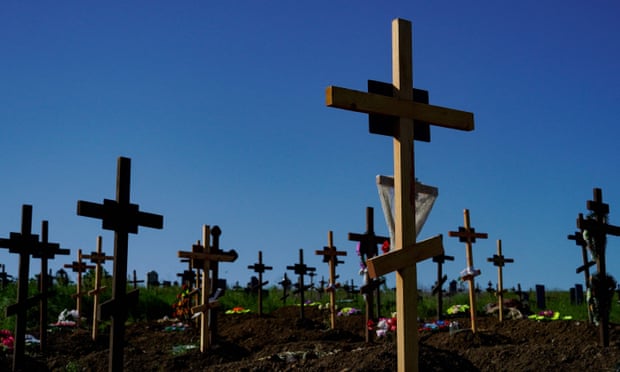 Fresh graves in the city of Mariupol.