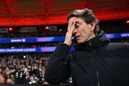 Tottenham coach Thomas Frank with his head in his hands