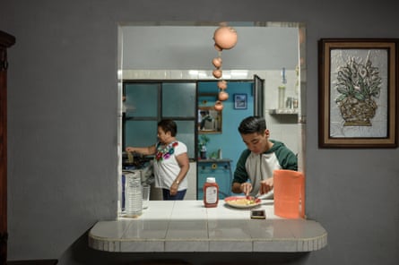 Young dancer Aaron de Jesus Marquez at home with his grandmother