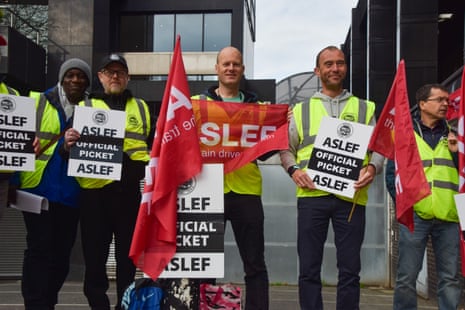 Aslef members on a picket line outside Euston station today.