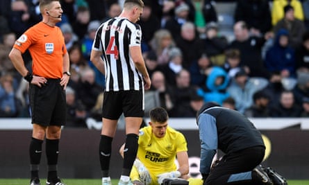 Nick Pope receives medical treatment during Newcastle’s win over Fulham after collapsing unchallenged.