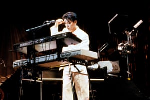 Ryuichi Sakamoto playing a Fairlight CMI Series III sampling synthesiser and a Yamaha DX7 keyboard.