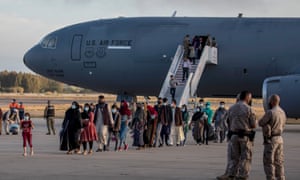 Afghan evacuees disembark from US Air Force plane at Rota Naval Base on August 31, 2021 in Rota, Spain.