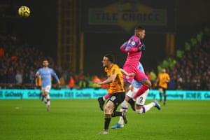 Diogo Jota is fouled by Ederson.