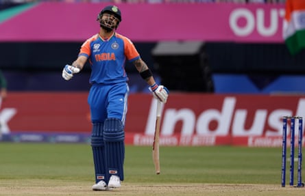 Virat Kohli reacts after losing his wicket early.