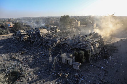 A building destroyed by Israeli airstrikes in the central Gaza Strip city of al-Zahra on Friday