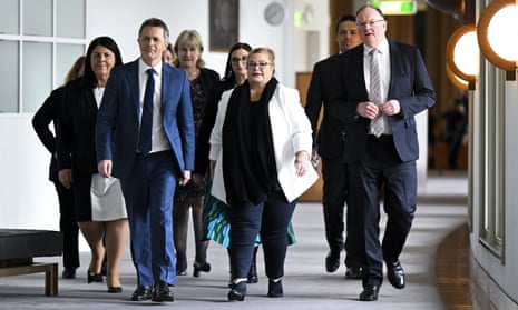 Australian Education Minister Jason Clare together with State and Territory counterparts arrive to speak to media after a meeting at Parliament House in Canberra