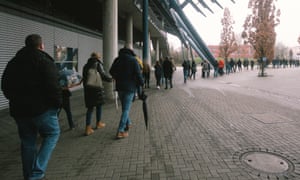 People wait in line to get their vaccines at König-Pilsener-Arena in Oberhausen, Germany
