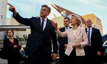 Plenkovic and Von der Leyen pointing towards something out of the picture to the left-hand side