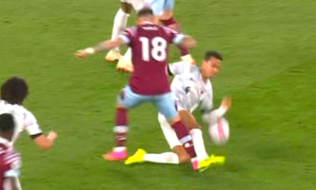 Liverpool's Thiago Alcântara falls on the ball in the penalty area