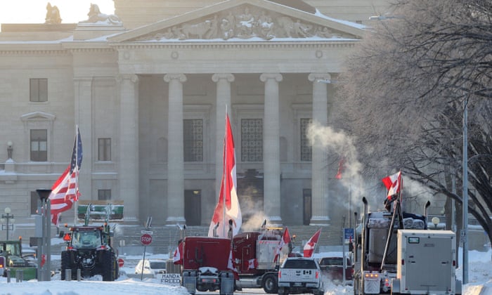 Trucks block traffic in front of Manitoba Legislative Building as truckers and their supporters continue to protest coronavirus vaccine mandates, in Winnipeg, Canada.