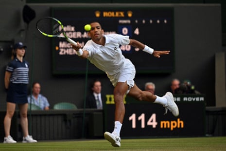 Auger-Aliassime stretches for a return to Michael Zheng