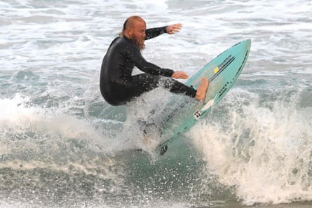 Johnston catches a wave off Cronulla beach.