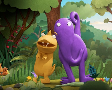 Kiri and Lou, an orange dinosaur and tall purple creature, stand together in a forest