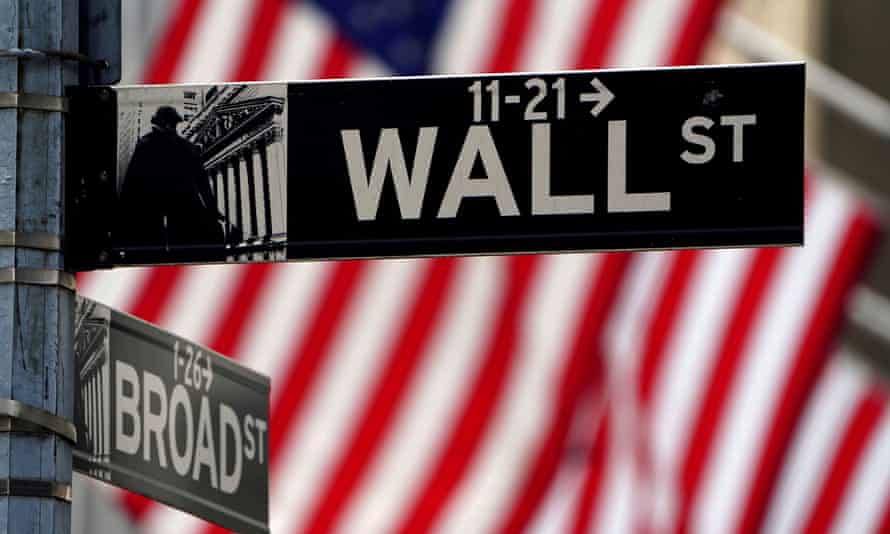 FILE PHOTO: FILE PHOTO: A Wall Street sign is pictured outside the New York Stock Exchange in New York<br>FILE PHOTO: A Wall Street sign outside the New York Stock Exchange in the Manhattan borough of New York City, New York, U.S., April 16, 2021. REUTERS/Carlo Allegri/File Photo