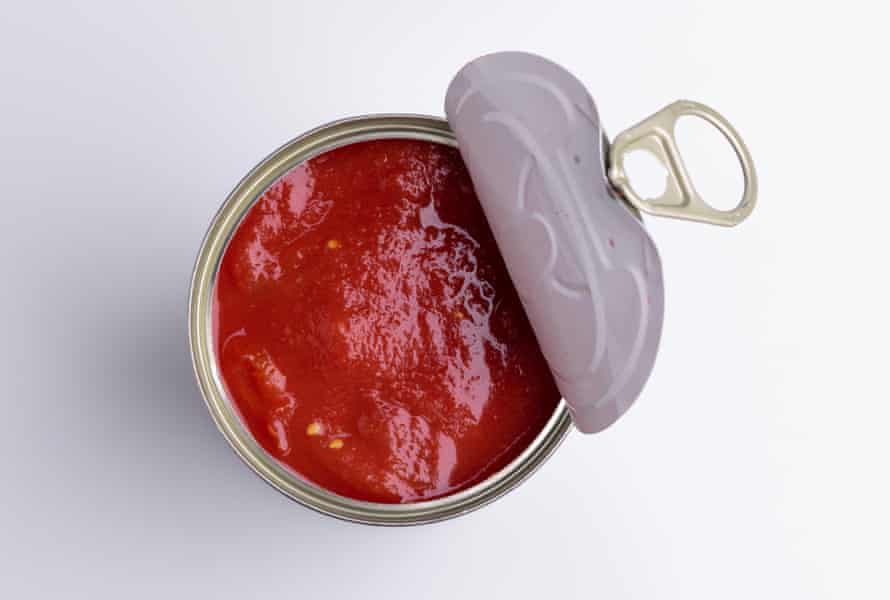 An open tin of tomatoes.