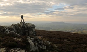Man on high rock, stiperstones ridge