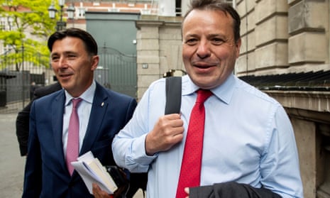 Leave.EU Brexit campaign co-founder Arron Banks, right, and political campaigner Andy Wigmore leave after facing questions by members of the DCMS committee.