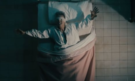 Screengrab of David Bowie in the video for Lazarus