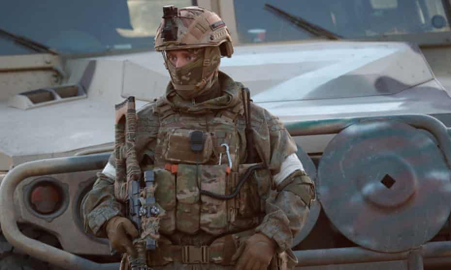 A Russian soldier near the Azovstal steel plant in Mariupol