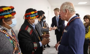 Photo by CHRIS JACKSON via Getty Images. Britain's Prince Charles, Prince of Wales (R)   speaks with Juan Carlos Jintiach, (L) coordinator of international economic cooperation and autonomous indigenous development for COICA (Coordinator of Indigenous Organizations of the Amazon Basin) and Tuntiak Katan,