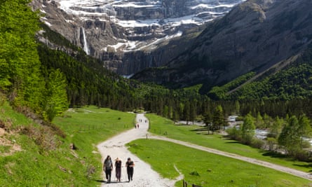 Tourists en route from Cirque de GavarnieCirque de Gavarnie is a spectacular natural rock amphitheater on the French side of the Pyrenees near Gavarnie, encircled by eleven 9,800 ft (3,000m) peaks. The central point of the Cirque are Gavarnie Falls, which at 787 ft (240m) are the longest in Europe.