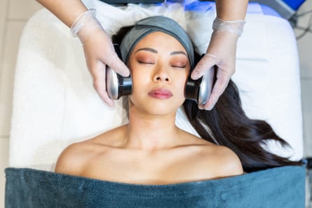 A woman receiving a beauty treatment