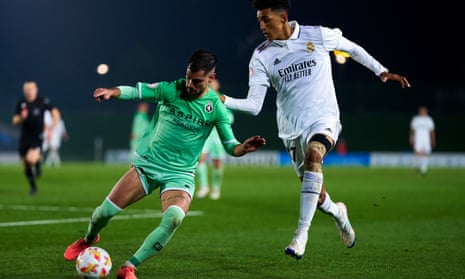Real Madrid Castilla’s Álvaro Rodriguez competes with Saúl González of Cultural Leonesa during a Primera Federación match in December