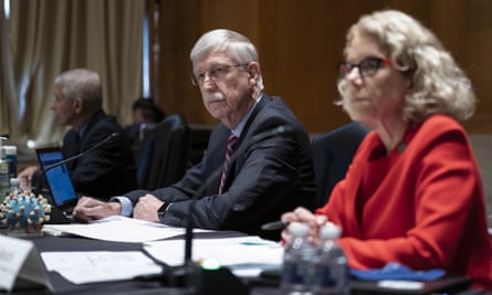 Dr Francis Collins listens during a Senate subcommittee hearing.