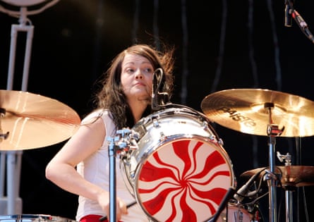 a woman drumming