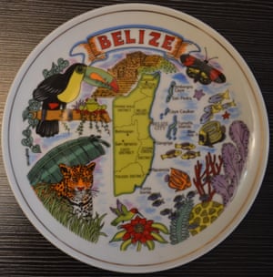 The exhibit features artworks by the Trinidad and Tobago artist Alicia Milne, who is showcasing touristic plates of Caribbean islands with subtle changes.