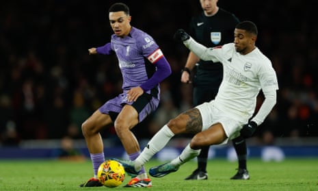Reiss Nelson (right) battles Trent Alexander-Arnold during Arsenal’s defeat to Liverpool, their third consecutive loss. 