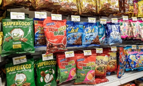 Snack foods in colourful packaging on display in a shop in Cartagena, Colombia.