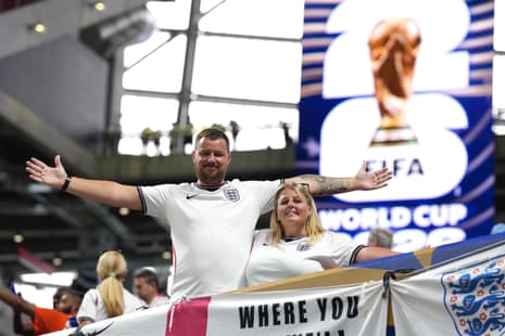 England fans pose for photographs in the stadium in Atlanta
