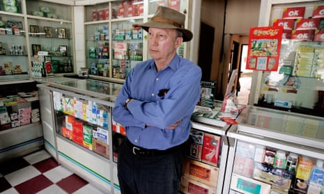 Phil Harvey in 2005 at a pharmacy in Hanoi, Vietnam, where cheap condoms subsidised by one of his organisations, DKT International, were sold.