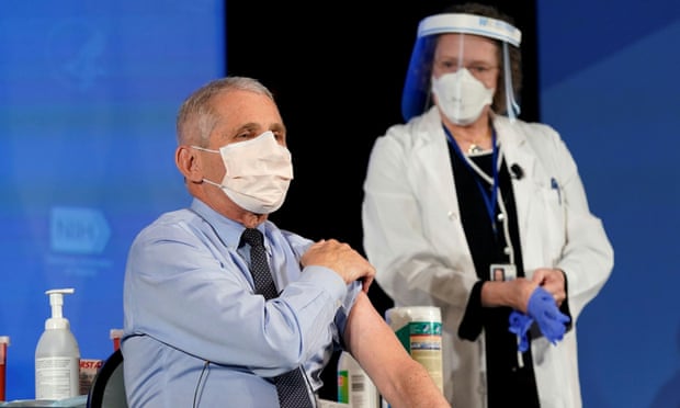 Anthony Fauci receives his first dose of the Moderna vaccine, in December.