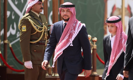 Jordan’s Crown Prince Hussein and his brother Prince Hashem attend a ceremony celebrating the country’s 73rd Independence Day in Amman, Jordan.