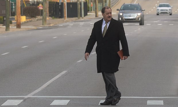Former Massey Energy CEO Don Blankenship makes his way across Virginia Street in Charleston, West Virginia on Wednesday.