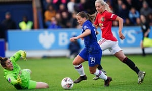 Chelsea's Fran Kirby attempts to round the Manchester United goalkeeper in a WSL match