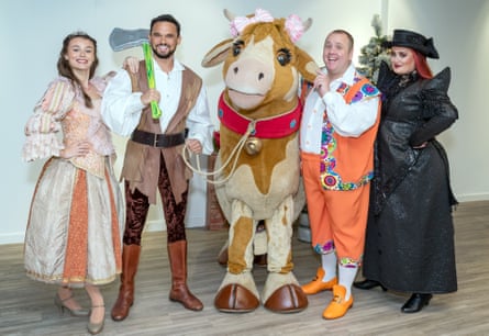 Allana Taylor, Gareth Gates, Neil Hurst and Chelsea Hall pose with the panto cow for Jack and the Beanstalk