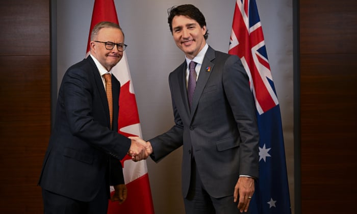Anthony Albanese shakes hands with Justin Trudeau