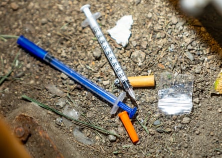 A syringe lies discarded on a sidewalk in Suva.