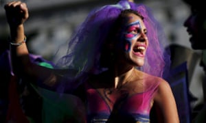 Buenos Aires, Argentina Outside the Congress women with their bodies painted shout slogans during a demonstration to mark International Women’s Day and to demand policies to prevent femicides