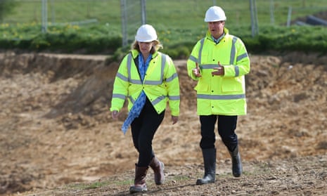 Amber Rudd with the prime minister, David Cameron, at a road development in Bexhill. ‘I think the decision last week risks making it a harder road,’ she said of the UK’s role in tackling climate change. 