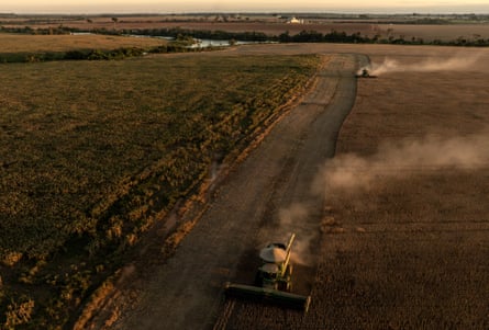 Drone shot of harvester moving through field