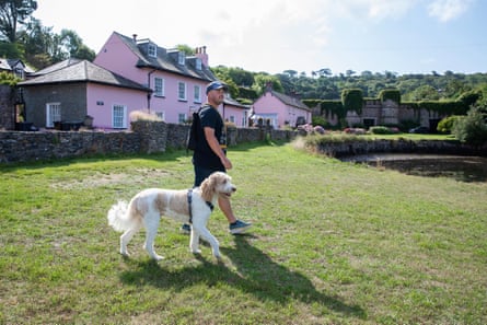 Phil Rendell and Ted the labradoodle admiring the view at Empacombe.