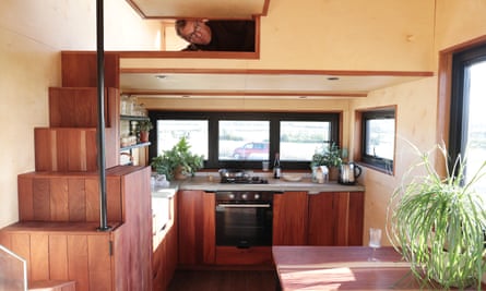 Robert Booth in his borrowed tiny home