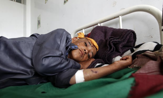 A child lies wounded in a clinic following a reported Saudi-led coalition airstrike in August.