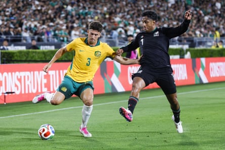 Alessandro Circati passes the ball for the Socceroos in the World Cup warm-up friendly against Mexico
